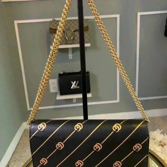 Gucci mini leather chain bag with double G stripe in black and gold. - Picture 11 of 14